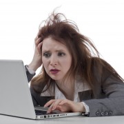 stressed businesswoman with laptop
